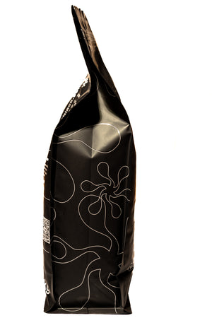 Black bag with white abstract patterns on a white background