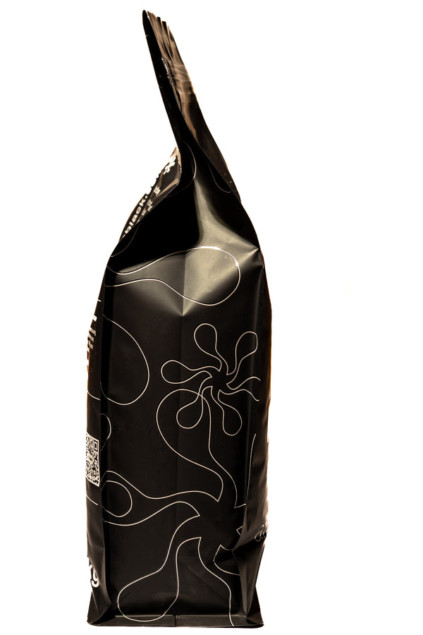 Black bag with white abstract patterns on a white background