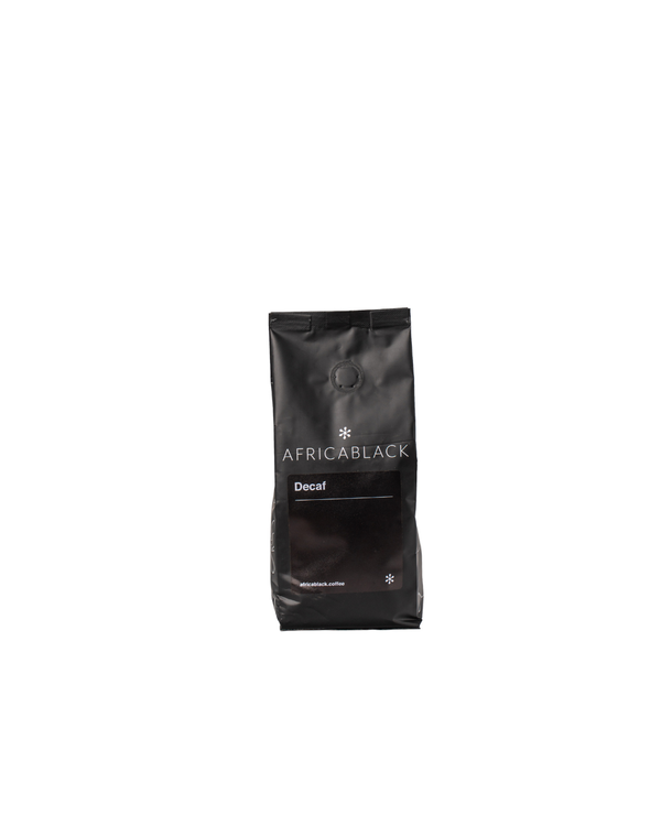 A sleek black bag of africablock colombian decaf coffee with minimalist white text highlighting the sugar cane process