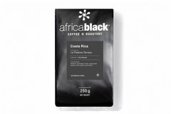Black coffee bag from Africa Black Coffee Roastery on a white background