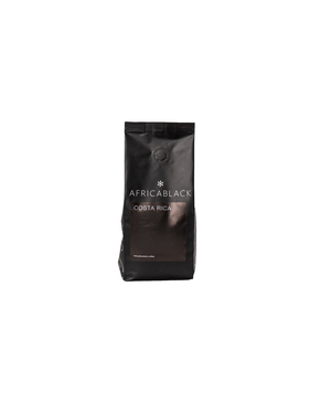 A sleek black bag of africa black costa rica coffee with minimalist white text and a subtle star logo from la pastora tarazza